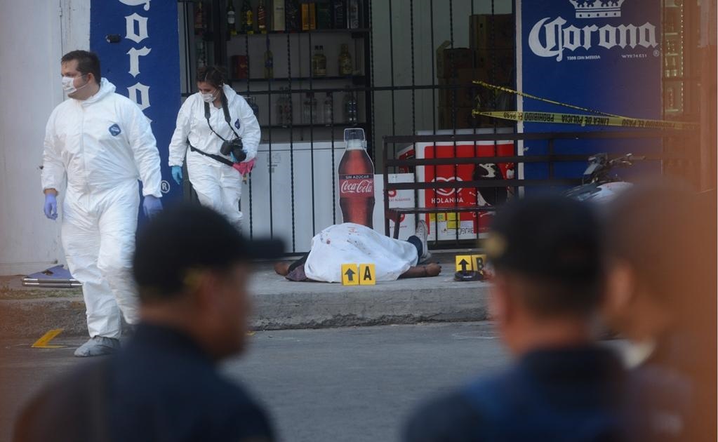 Los cuerpos de los hombres muertos, de 25, 26 y 40 años de edad, ya fueron identificados.Foto: Guillermo Perea/El Gráfico