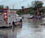 No logró cruzar avenida inundada