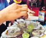 Recomiendan precaución en consumo de mariscos