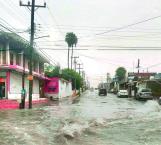 Inundan lluvias las zonas bajas