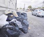 Se van los comerciantes; dejan basura acumulada